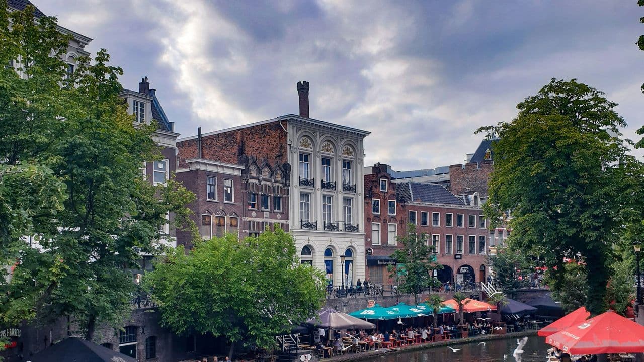 outdoor cafes in both sides of canal
